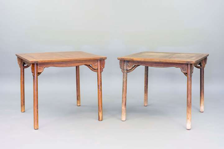 A pair of huanghuali square tables with triple aprons and stretchers